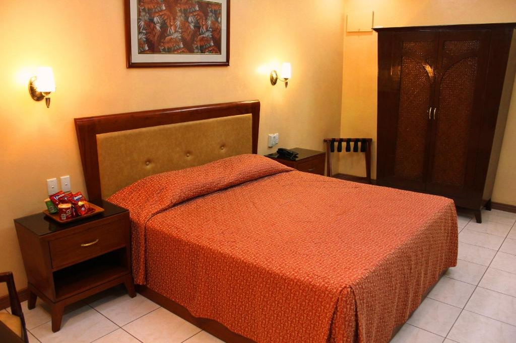 Pacific Breeze Hotel Room and Resort